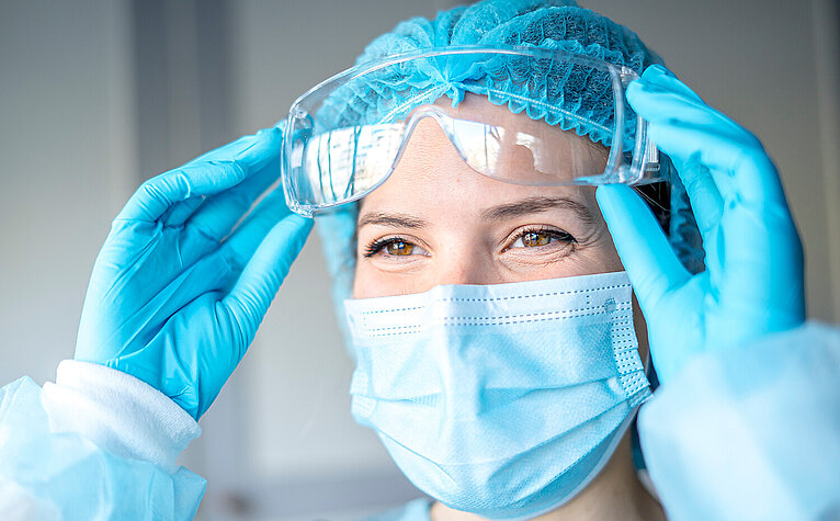 Woman with Protective clothing LifeSciences