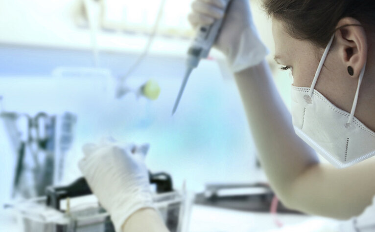 Woman in biotech lab