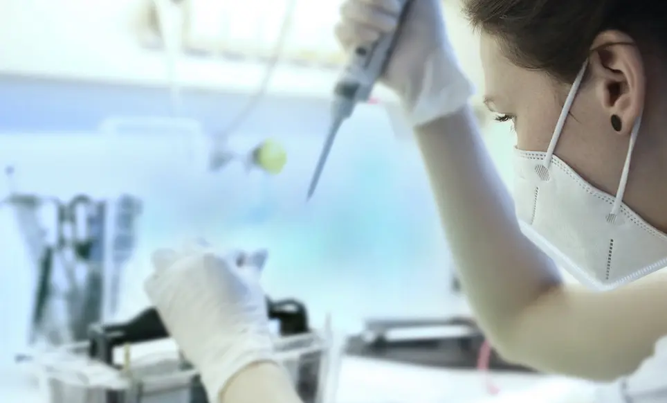 Woman in biotech lab