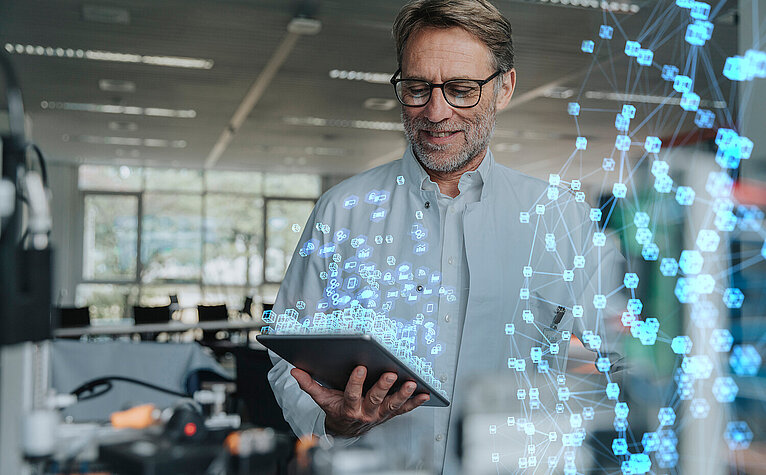 Man with digitalised tablet