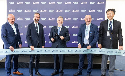 Opening of Lam Research Panel Center of Excellence in Salzburg with ribbon cutting and representatives from semiconductor industry