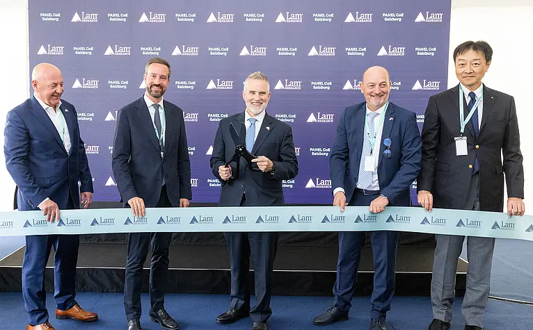 Opening of Lam Research Panel Center of Excellence in Salzburg with ribbon cutting and representatives from semiconductor industry