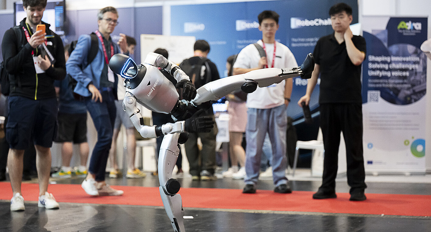 The humanoid robot from Unitree Robotics demonstrates its ability to maintain balance.