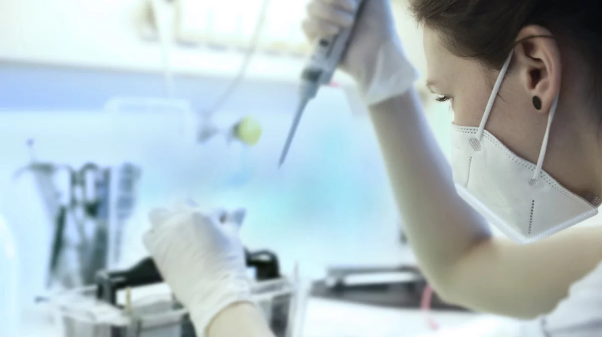 Woman in biotech lab